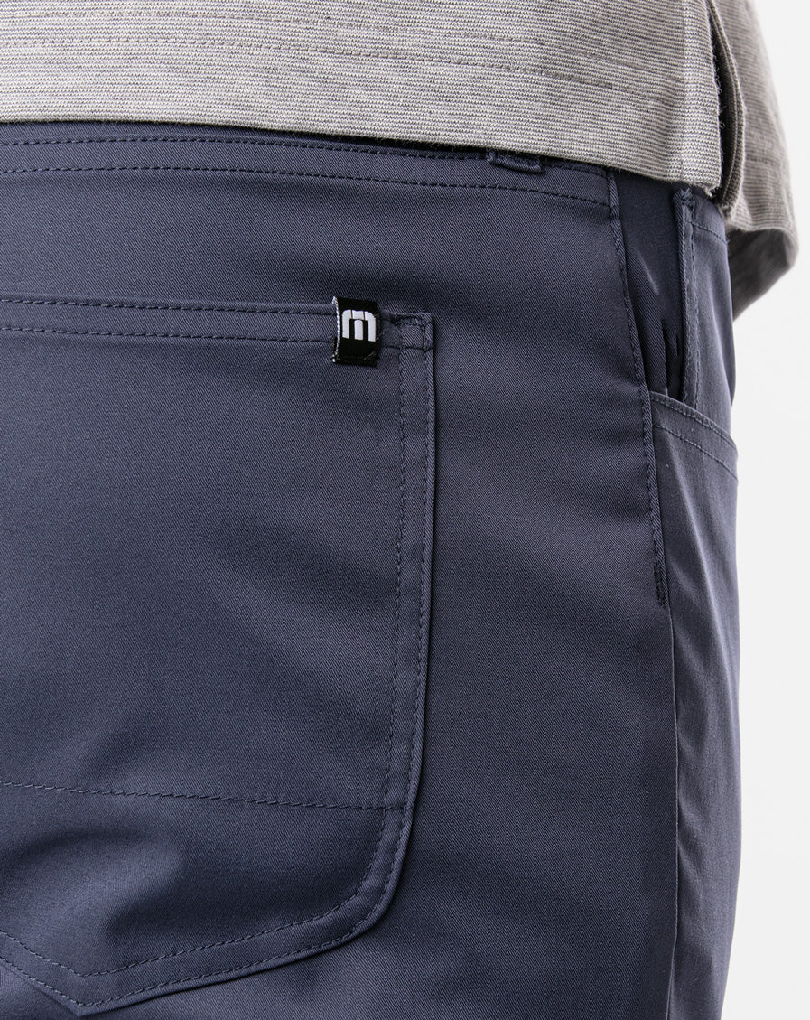 TRAVIS MATHEW NAVY OPEN TO CLOSE PANTS